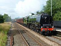 The Duchess of Sutherland, 46233,  passes Smithy Bridge, at 0929 on 3rd August 2012 with the Scarborough Flyer.  (Photo S Carmichael)